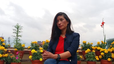 Indian mountain climber Anshu Jamsenpa, who climbed Everest twice in five days, attends her interview at a hotel in Kathmandu, Nepal. Yubaraj Sharma Chapagain / Reuters