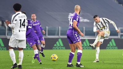 Cristiano Ronaldo takes a shot at goal against Fiorentina. EPA