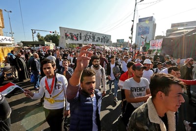 Iraqi anti-government protesters are pictured at Tahrir square on November 19, 2019. AFP