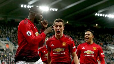 Romelu Lukaku (L) celebrates scoring against Newcastle. EPA