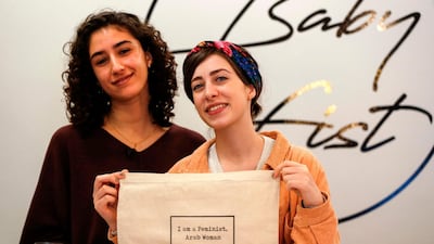Palestinian fashion designer Yasmeen Mjalli, left, and her creative director Amira Khader. AFP