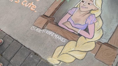 Casey Drake reimagines fairty tale characters like Rapunzel in her sidewalk artworks to comment on the coronavirus pandemic. Casey Drake
