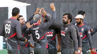 UAE players celebrate after defeating Papua New Guinea in a Twenty20 match at Sheikh Zayed Cricket Stadium in Abu Dhabi on April 12, 2017.Pawan Singh / The National