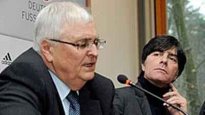 Theo Zwanziger, left, the president of the German Football Association (DFB) and coach Joachim Löw put on a united front at a press conference on Tuesday.