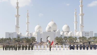 Members of the UAE Armed Forces participate in the flag raising ceremony at Wahat Al Karama. Philip Cheung / The Crown Prince Court - Abu Dhabi