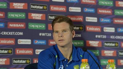 Australia captain Steve Smith gestures as he answers a question during a press conference ahead of the World T20. Dibyangshu Sarkar / AFP / March 12, 2016