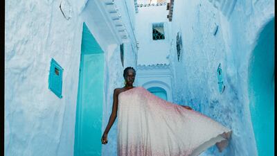 Dress, Dh5,250, Dima Ayad at The Modist. Earrings, Dh876, Elsa O. Boots, Dh5,839, Salvatore Ferragamo