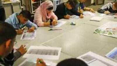 A government "tool kit" requires teachers to incorporate threats posed by extremist groups into class discussions.