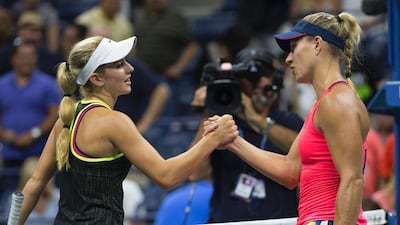 CiCi Bellis of the US, left, and Angelique Kerber of Germany meet at the net after their US Open match on Friday night. Don Emmert / AFP / September 2, 2016