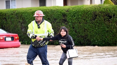 Volunteers and emergency services workers have been helping thousands of residents to leave flooded areas