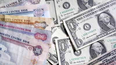 The UAE central bank defended the dirham’s peg to the dollar in December amid the plunge in crude oil prices. Ryan Carter / The National