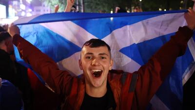 Scotland fans celebrate in London after the 0-0 draw with England. Reuters
