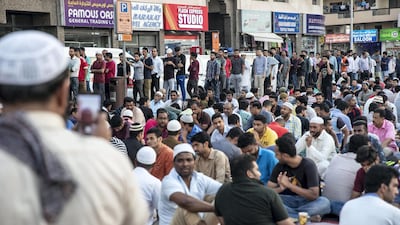 Iftar meals distributed at the New Fatima Mosque adjacent to the Al Ghubaiba Bus Station in Bur Dubai. Antonie Robertson / The National