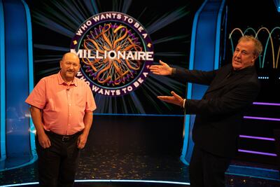 Jeremy Clarkson, right, host of Who Wants To Be A Millionaire, with contestant Donald Fear winning the ITV show's £1 million prize.