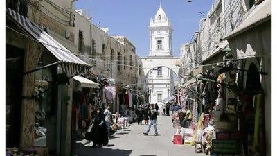 People shop at a market in the old city of the Libyan capital of Tripoli.