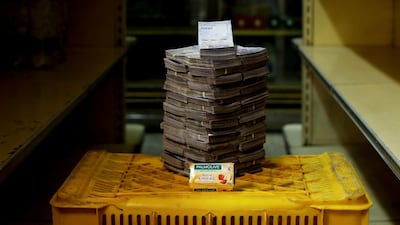 A bar of soap is pictured next to 3,500,000 bolivars