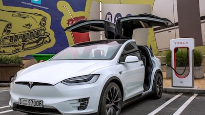 A Tesla Model X at the Last Exit, Sheikh Zayed Road, Jebel Ali. Dubai is to be a launchpad for the US car maker which has narrowed losses recently. Victor Besa / The National