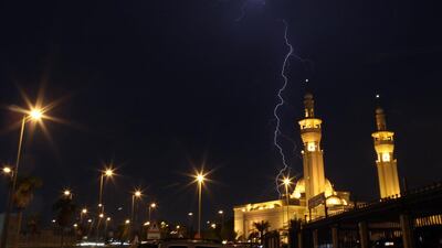 Lightning strikes in the sky over Kuwait City. Yasser Al Zayyat / AFP