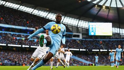 Yaya Toure of Manchester City controls the ball during his side's 2-1 Premier League victory over Swansea City at the Etihad Stadium on Saturday. Juan Kruger / Getty Images / November 22, 2014