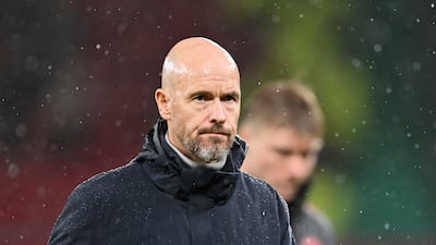 Erik ten Hag, manager of Manchester United, looks dejected after the team's defeat in the Premier League match against Manchester City. Getty Images