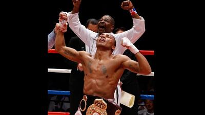 Liborio Solis, front, of Venezuela celebrates after defeating Kohei Kono of Japan at their WBA boxing superfly weight title bout in Tokyo. (Issei Kato / Reuters)