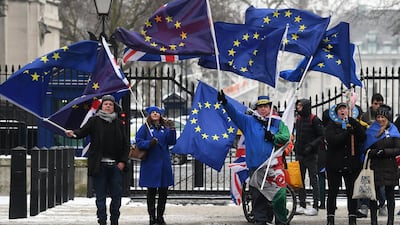Pro EU protesters outside Downing Street in London. The EU divorce is making many people, British and foreign, in the UK and abroad, reassess their long-term personal outlooks. Andy Rain/EPA