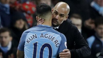 Manchester City manager Pep Guardiola embraces Sergio Aguero as he is substituted off on Saturday. Carl Recine / Action Images / Reuters / November 5, 2016