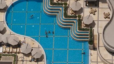 The tenant should ask for a certificate from the developer to confirm that the landlord has paid up all service fees.