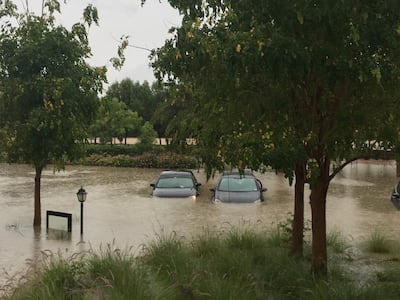 Cars are left submerged after the storm hit Dubai.