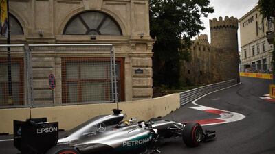 Lewis Hamilton steers his car at the Baku City Circuit during the second practice session. Kirill Kudryavtsev / AFP