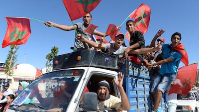 Moroccans wave national flags during celebrations in Laayoune, the main city in Western Sahara, of the 40th anniversary of the Green March that led to the reclaiming of the region from Spanish colonial rule. Fadel Senna / AFP /November 6, 2015