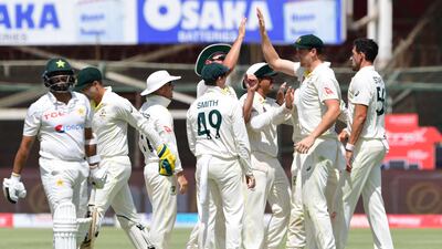 Australia celebrate after the dismissal of Pakistan's Azhar Ali for 14. AFP