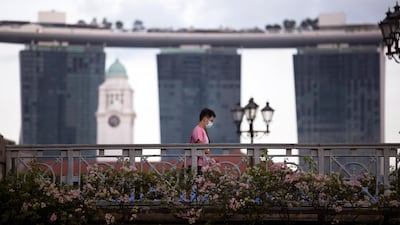 Singapore's Prime Minister Lee Hsien Loong announced on Friday that the city state will close schools and most workplaces except for essential services next week as part of the government's stricter measures to combat the ongoing coronavirus pandemic. EPA