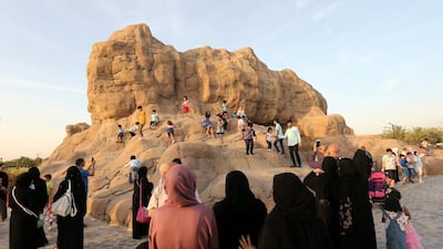 Visitors are seen outside the Cave of Miracles, part of Dubai's Quranic Park. Reuters
