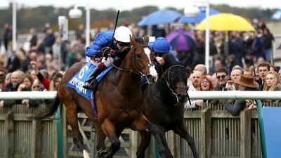 Military March, ridden by Oisin Murphy, won The Dubai Autumn Stakes. Press Association