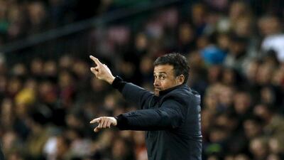 Barcelona manager Luis Enrique gestures during his team's match against Sevilla in La Liga on Sunday night. Albert Gea / Reuters / February 28, 2016