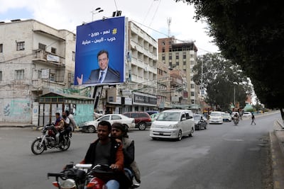 A poster featuring Lebanese Information Minister George Kordahi in Sanaa on October 31. Reuters