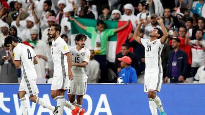 Al Jazira’s Romarinho celebrates scoring their first goal with teammates. Reuters