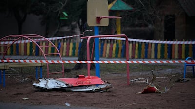 Parts of the helicopter in a playground near the crash site. AP