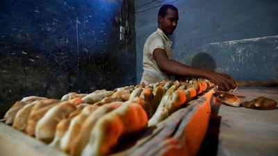 Sudanese bakers prepare bread at a bakery in the town of Atbara, an industrial town 350 kilometres northeast of Sudan’s capital Khartoum. In December 2018, authorities raised the official price of a 70-gram loaf from one Sudanese pound to three, prompting a rush on bakeries and long queues for bread -- sparking the rallies that marked the beginning of the end for Bashir. A year since bread prices tripled overnight, sparking protests in the Sudanese town of Atbara, residents say bakeries are producing more loaves than the town can eat. AFP