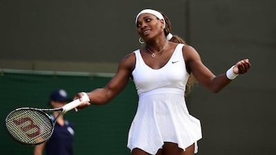 Serena Williams reacts during her third round loss to Alize Cornet on Saturday at the 2014 Wimbledon Championships. Carl Court / AFP / June 28, 2014