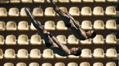 Synchronised divers train at the Rio Olympics diving venue. Damir Sagolj / Reuters