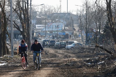 Cyclists in the city of Volnovakha in the Donetsk region, after Russian-backed separatists wrestled control of it from Ukrainian troops. Reuters