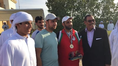 Sheikh Saeed Al Maktoum, second right, prevailed in a shoot-out battle to win the individual skeet competition. Courtesy Asian Shotgun Championship