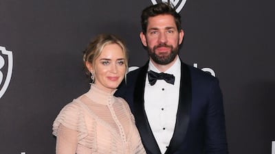 Emily Blunt wears a classic blush-coloured Alexander McQueen dress paired with a Jimmy Choo clutch and Alexander Birman shoes, while hubby John Krasinski dons Brunello Cucinelli tux and Christian Louboutin shoes. AFP / Jean-Baptiste LACROIX