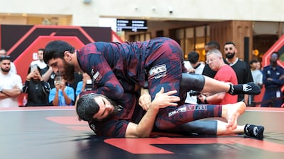 Magomed Ankalaev going through wrestling drills.