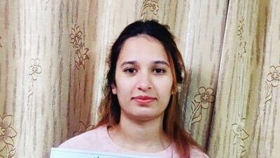 Monika holds the Period Chart that she has put up at her home in Haryana.The chart is an initiative by Sunil Jaglan, a social worker to raise awareness about menstrual health. Taniya Dutta for The National