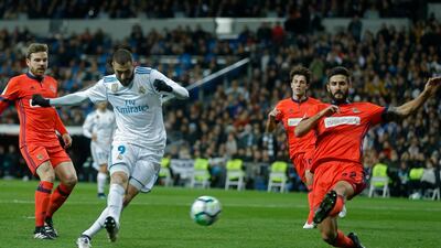 Real Madrid's Karim Benzema, left, will be in the spotlight on Tuesday night. Francisco Seco / AP Photo
