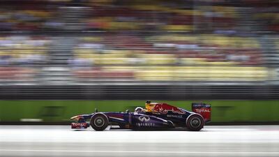 Sebastian Vettel was fastest in practice in Singapore in his Red Bull Racing car.