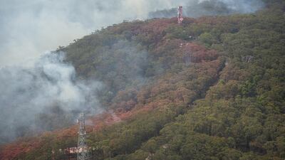 An aerial view of lines of fire retardant during a flight over Kurrajong Heights with Australian Prime Minister Scott Morrison (unseen) as he tours bushfire-affected regions of the Blue Mountains, west of Sydney, New South Wales (NSW), Australia, 23 December 2019. EPA